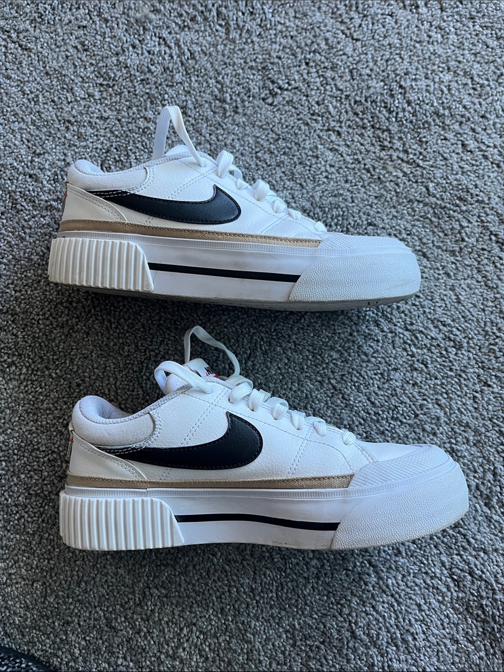 Nike White Low-Top Sneakers with Black Swoosh and Red Logo - Picture 4 of 5